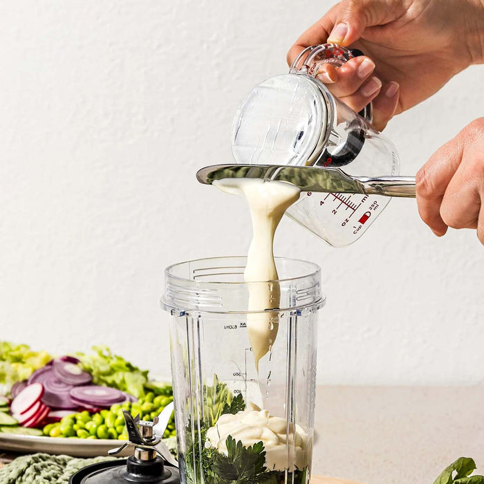 Dreamfarm Upcup adjustable measuring cup with mayo.