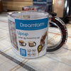 Dreamfarm Upcup adjustable measuring cup showing merchandise label.